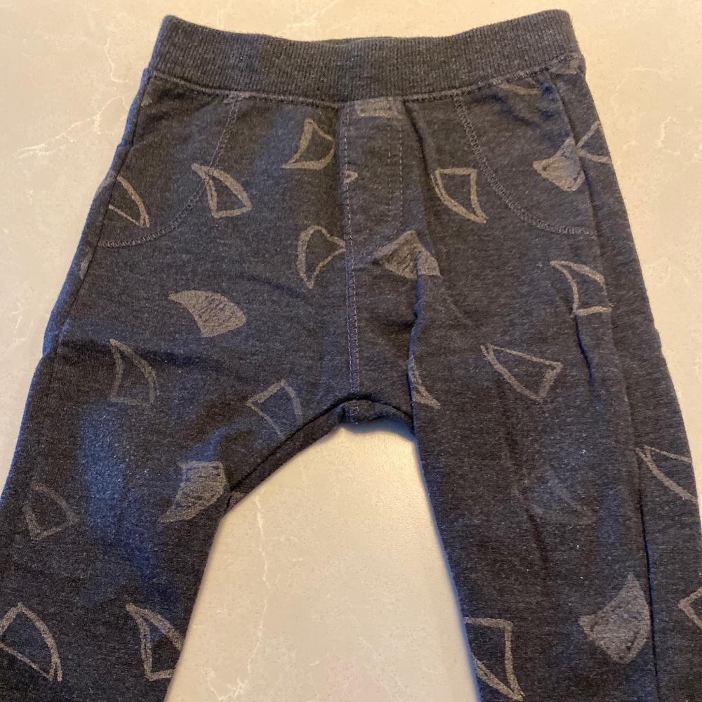 Gray pants with shark fins